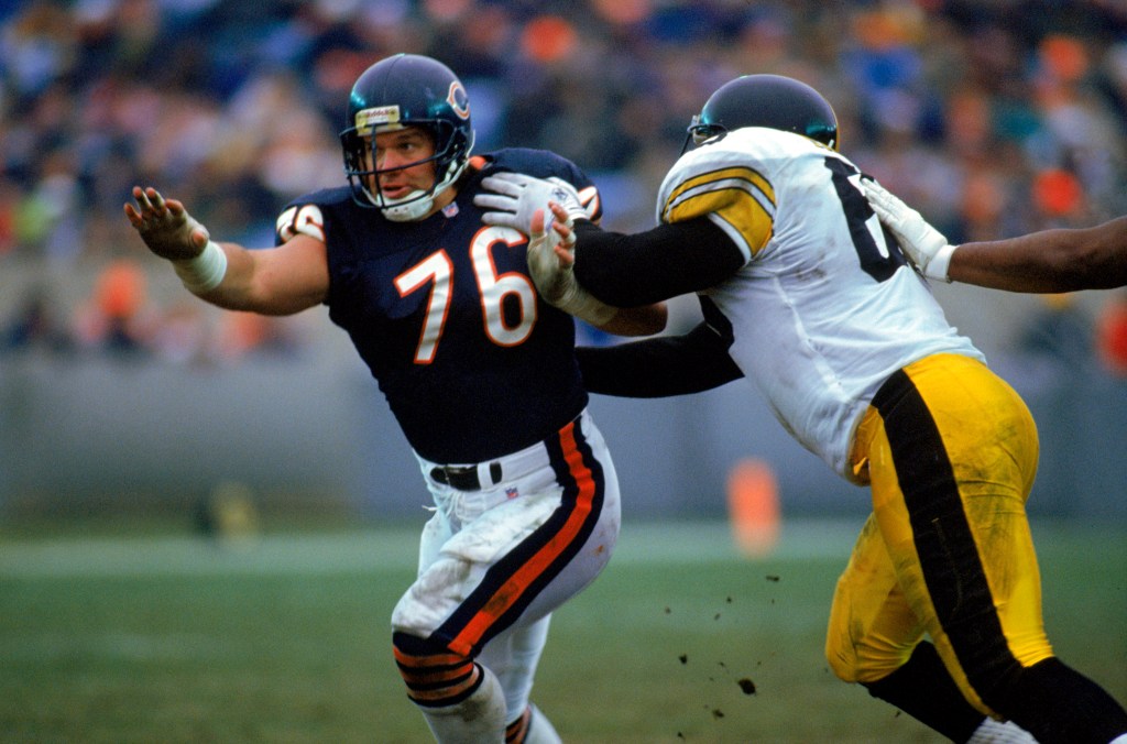 Steve McMichael #76 of the Chicago Bears looks for the pass during the game against the Pittsburgh Steelers on December 13, 1992 in Chicago, Illinois. The Bears won 30-6. 