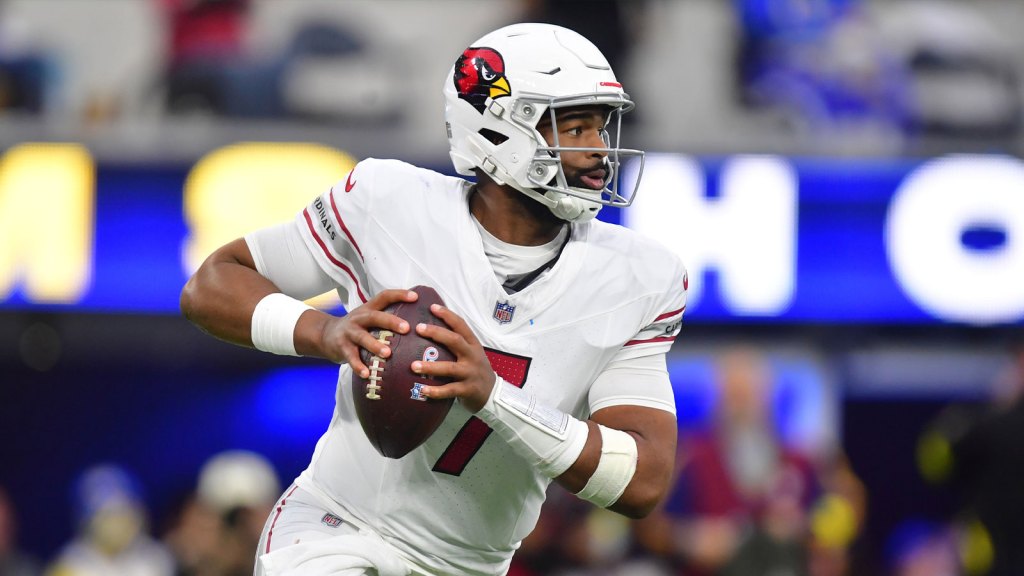 Arizona Cardinals quarterback Jacoby Brissett (7) rolls out against the Los Angeles Rams during the second half at SoFi Stadium.