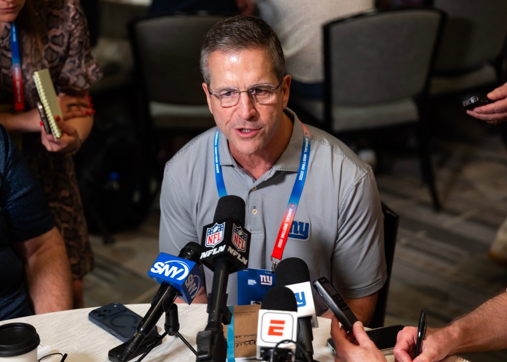 Giants head coach John Harbaugh talks to reporters during the 2026 NFL Annual League Meeting at the Arizona Biltmore on March 30, 2026.