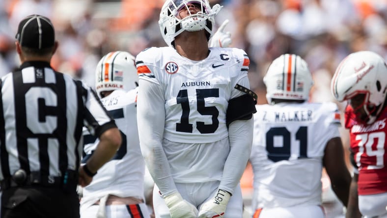 Auburn defensive end Keldric Faulk celebrates a stop during a game against South Alabama at Jordan-Hare Stadium. Vikings draft surprises