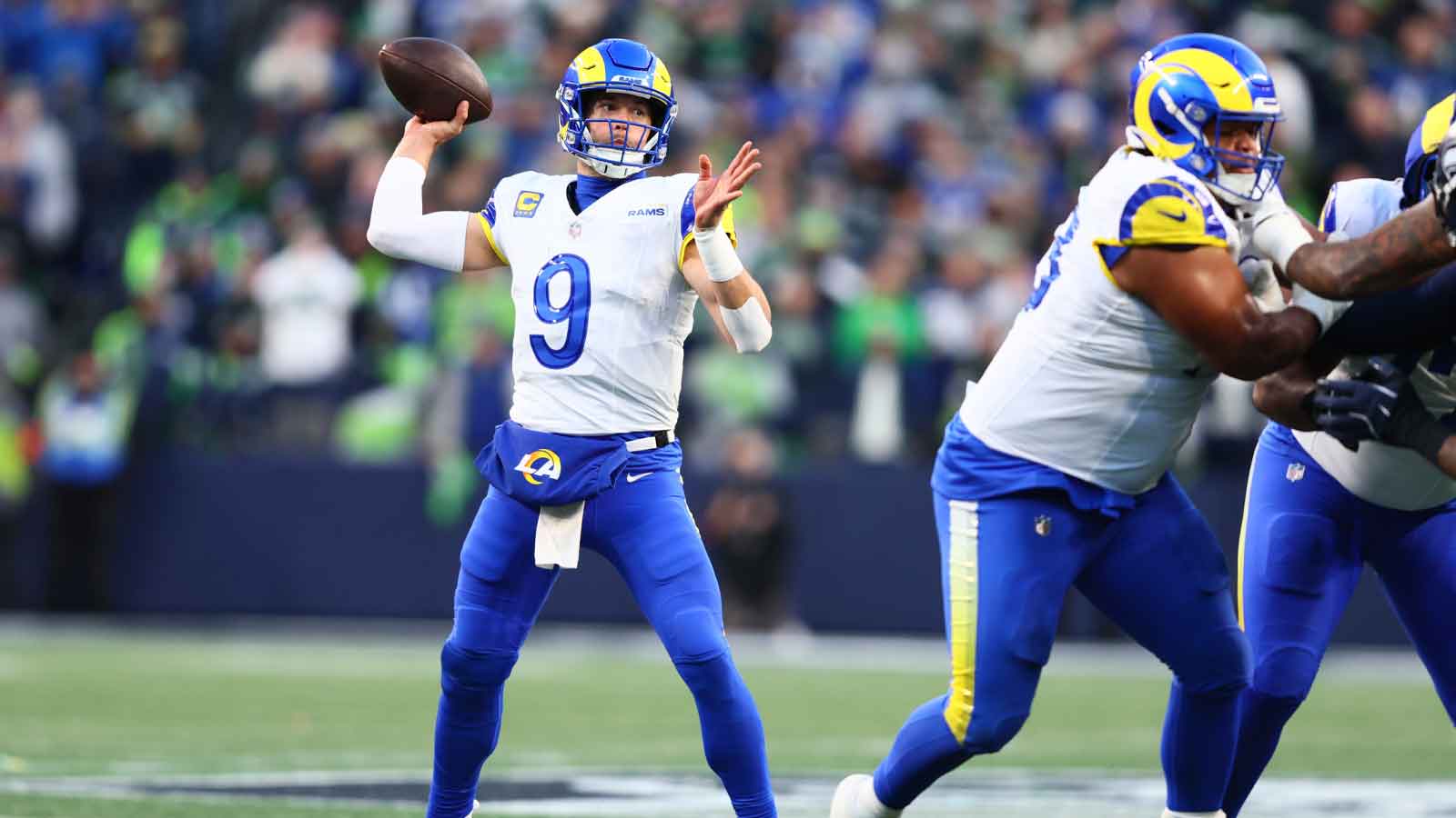 Los Angeles Rams quarterback Matthew Stafford (9) passes against the Seattle Seahawks during the first half in the 2026 NFC Championship Game at Lumen Field.