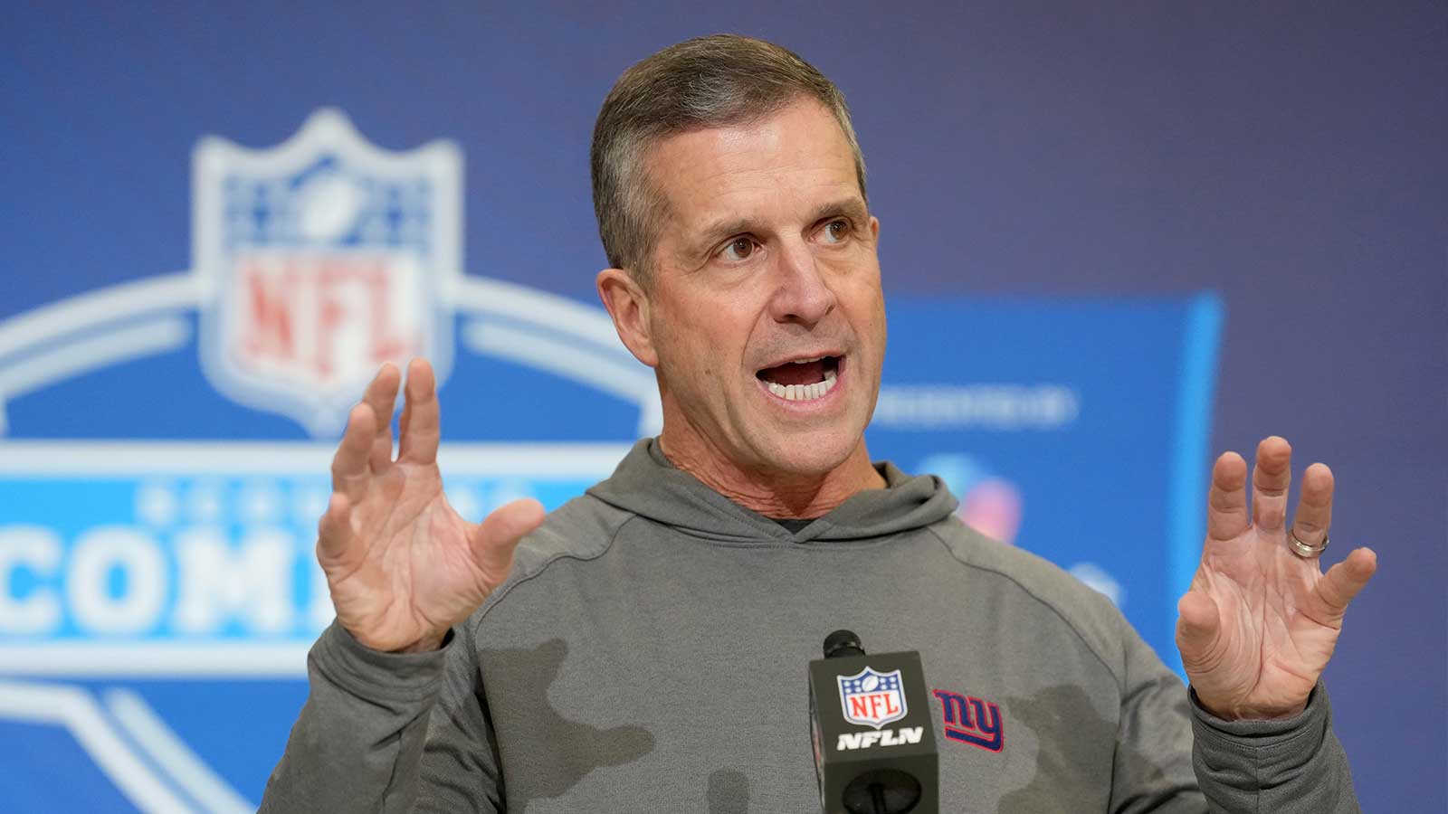 New York Giants coach John Harbaugh speaks at the NFL Scouting Combine at the Indiana Convention Center.
