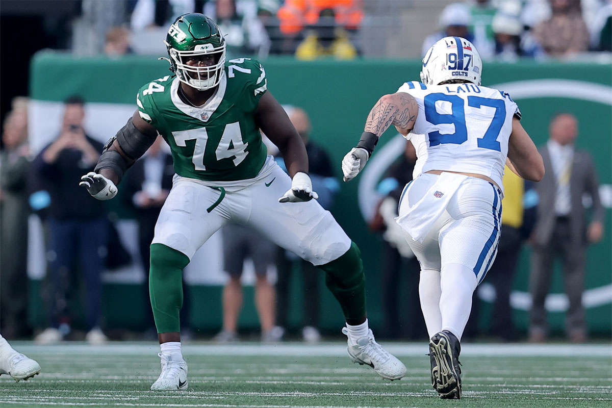 New York Jets offensive tackle Olu Fashanu (74) blocks against Indianapolis Colts defensive end Laiatu Latu (97) during the second quarter at MetLife Stadium.