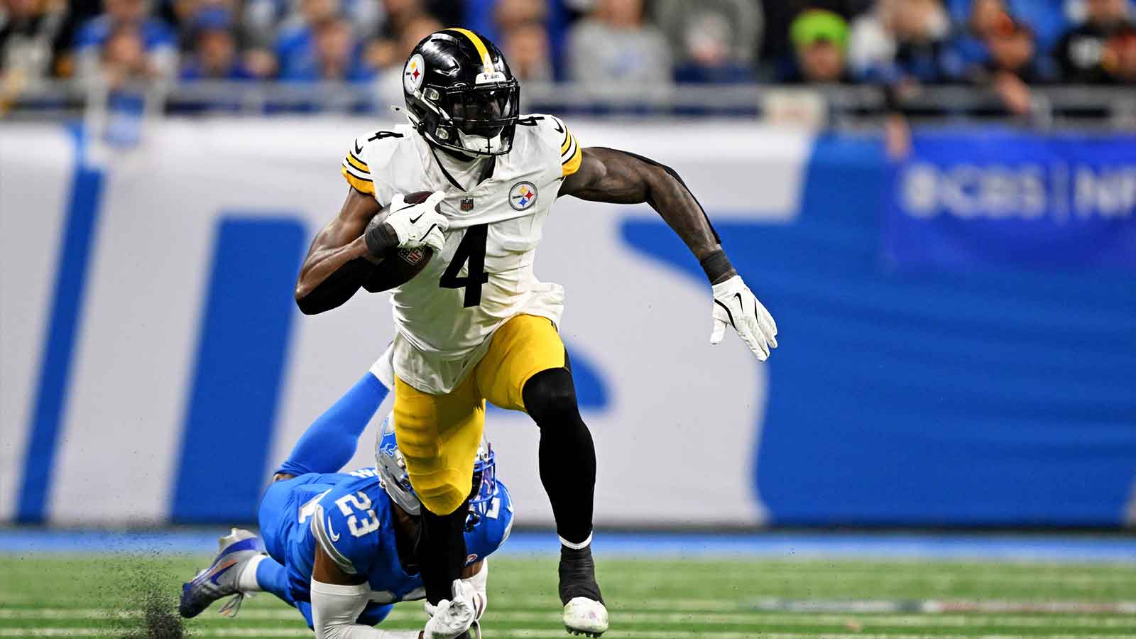 Detroit Lions cornerback Rock Ya-Sin (23) tackles Pittsburgh Steelers wide receiver DK Metcalf (4) during the fourth quarter at Ford Field.