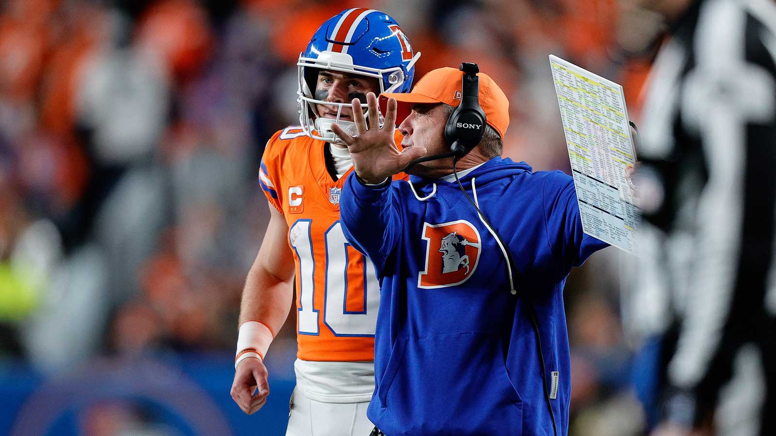 Denver Broncos quarterback Bo Nix (10) talks with head coach Sean Payton in the fourth quarter against the Las Vegas Raiders at Empower Field at Mile High. Mandatory Credit: Isaiah J. Downing-Imagn Images