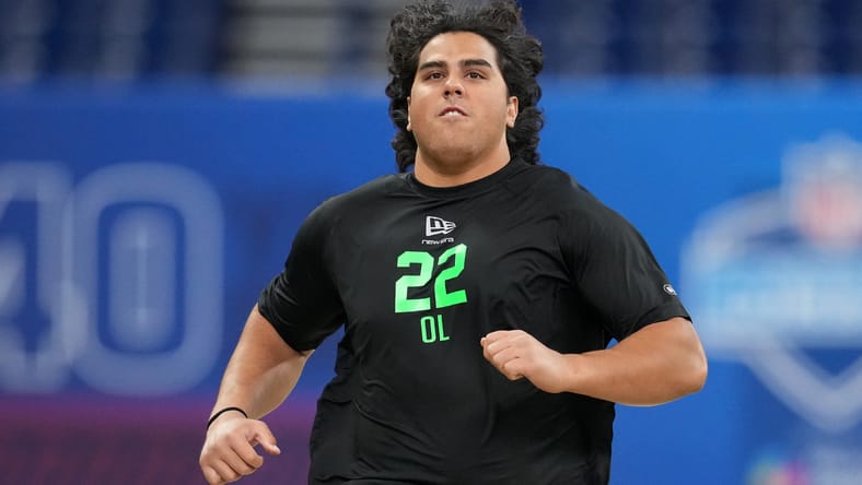 Spencer Fano performs drills at the NFL Scouting Combine. vikings myths and misses 2026