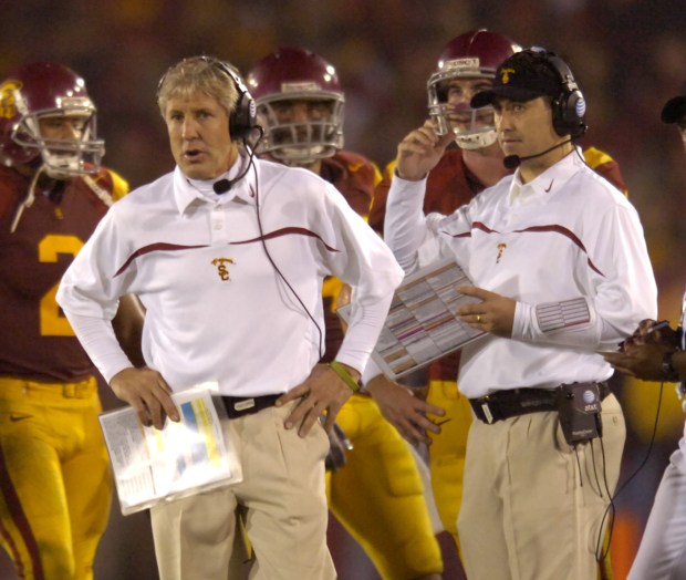 Head coach Pete Carroll, left, and assistant Steve Sarkisian on the sidelines for the USC Trojans during a game with California on Nov. 18, 2006. USC won, 23-9. (Photo by Scott Varley, The Daily Breeze/SCNG)