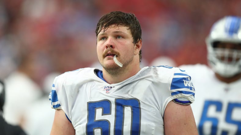 Detroit Lions center Graham Glasgow lines up on the offensive line against the Arizona Cardinals at State Farm Stadium. vikings rumors jonathan greenard dallas turner graham glasgow.