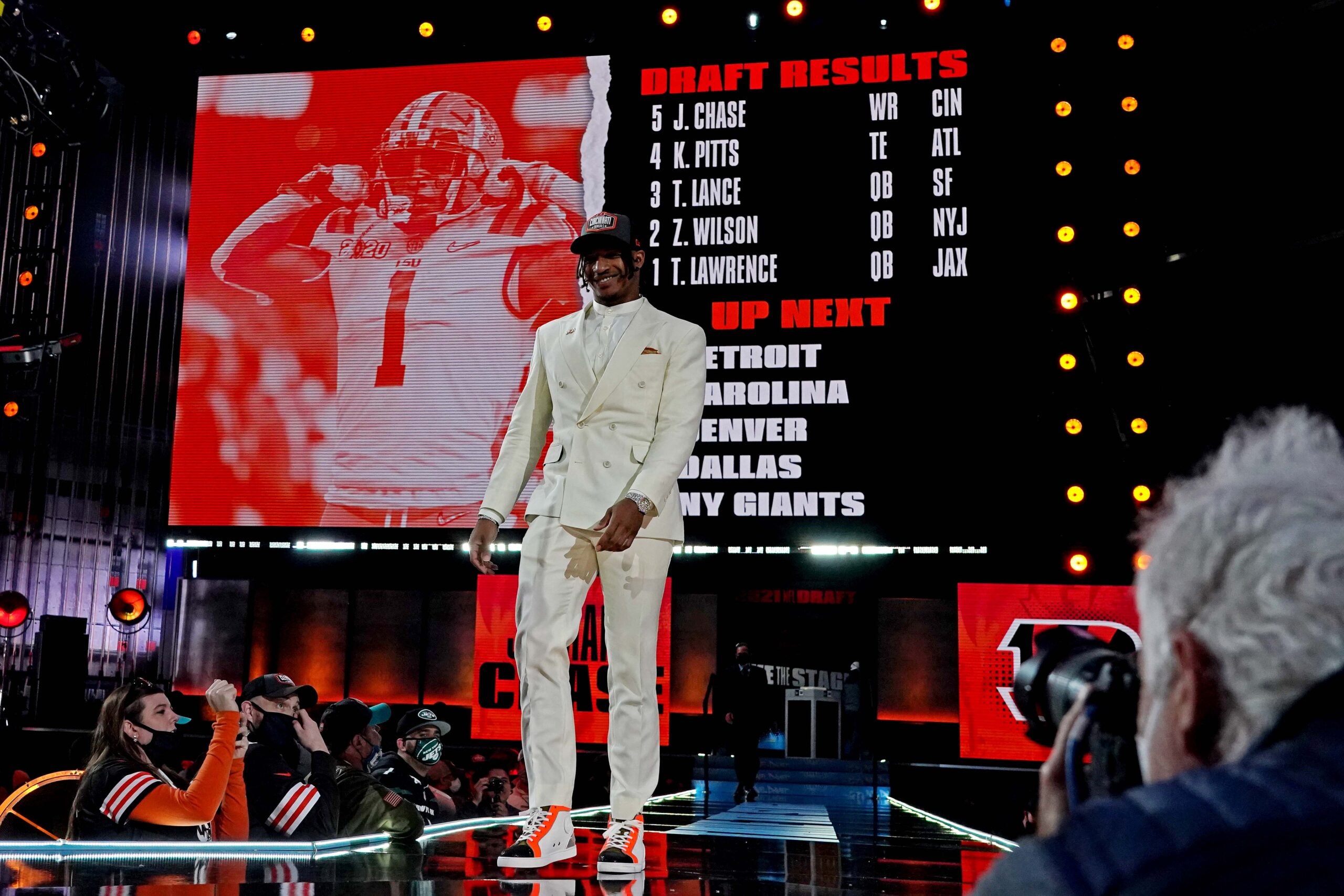 Apr 29, 2021; Cleveland, Ohio, USA; Ja'Marr Chase (LSU) walks on stage after being selected by Cincinnati Bengals as the number five overall pick in the first round of the 2021 NFL Draft at First Energy Stadium.