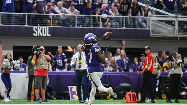 K.J. Osborn catches a touchdown pass against the Detroit Lions. vikings myths and misses 2026