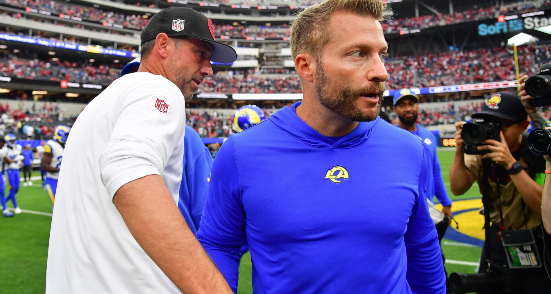 Sep 17, 2023; Inglewood, California, USA; San Francisco 49ers head coach Kyle Shanahan meets with Los Angeles Rams head coach Sean McVay following the victory at SoFi Stadium.