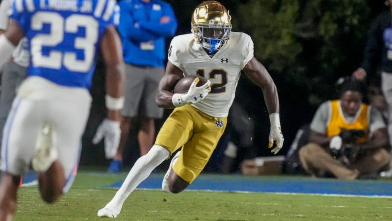 Jeremiyah Love runs after a catch against Duke during a game at Wallace Wade Stadium. jeremiyah love vikings