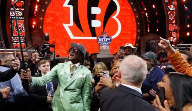 Dallas Turner, a linebacker from the University of Alabama, uses a selfie stick to pose with fans. He was selected by the Minnesota Vikings during the first round of the 2024 NFL draft at the NFL draft theater in Detroit on Thursday, April 25, 2024.