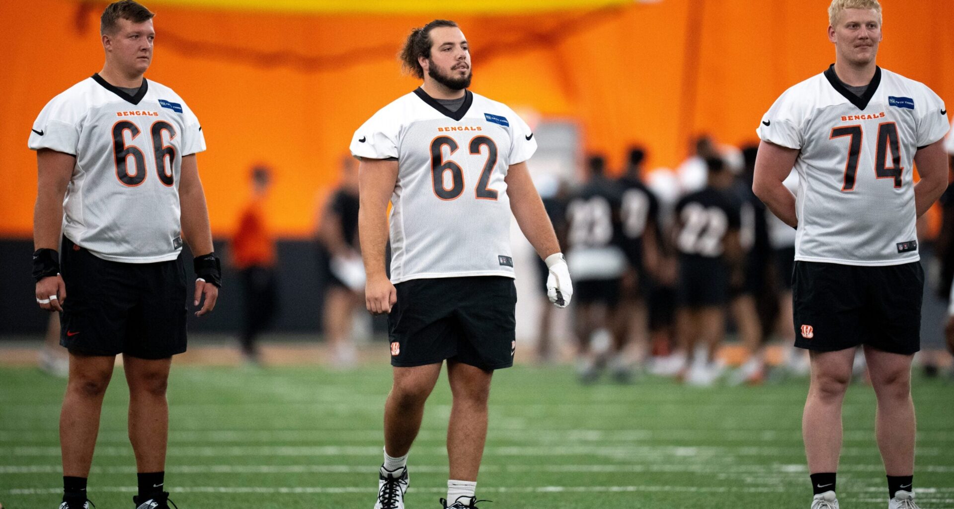 Cincinnati Bengals center Nate Gilliam (66), Cincinnati Bengals center Matt Lee (62) and Cincinnati Bengals offensive tackle Eric Miller (74) look on at Bengals spring practice at the IEL Indoor Facility in Cincinnati on Thursday, June 13, 2024.