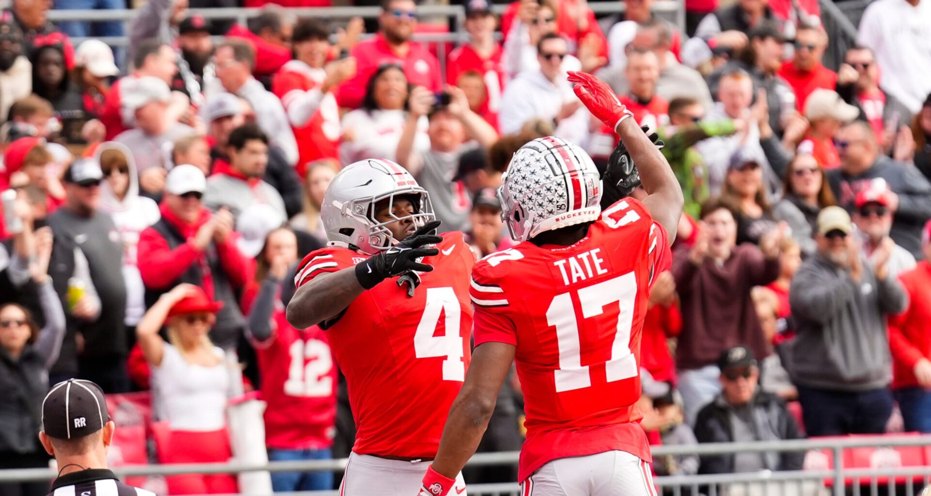 Ohio State Buckeyes wide receiver Jeremiah Smith (4) celebrates with wide receiver Carnell Tate (17) after Smith scored a touchdown in the first half at Ohio Stadium on Saturday, Nov. 9, 2024 in Columbus, Ohio.