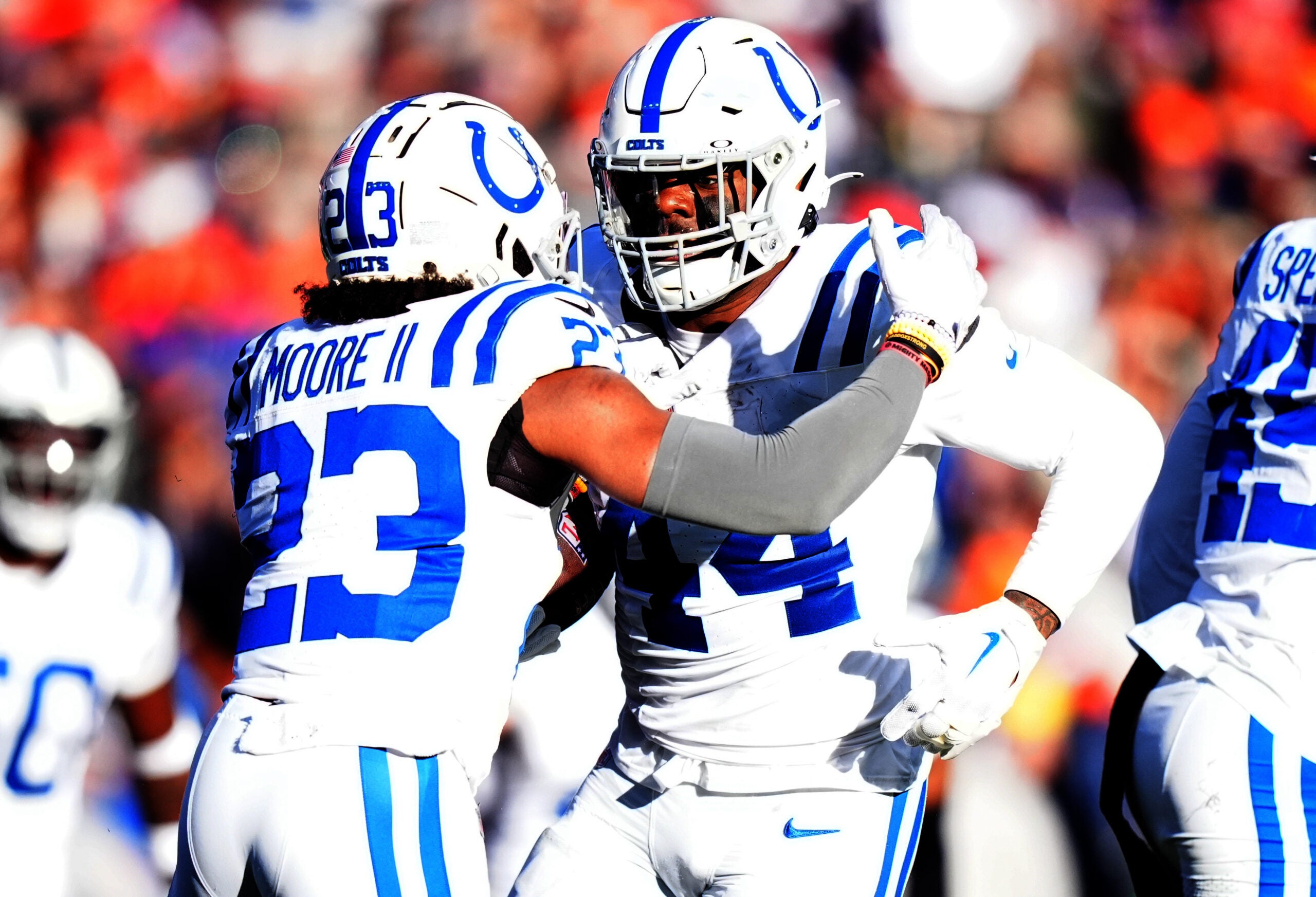 Dec 15, 2024; Denver, Colorado, USA; Indianapolis Colts linebacker Zaire Franklin (44) celebrates his interception with cornerback Kenny Moore II (23) in the first quarter against the Denver Broncos at Empower Field at Mile High.