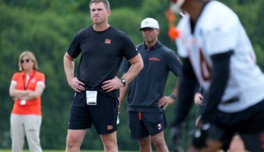 Cincinnati Bengals head coach Zac Taylor watches during a session of organized team activities on the Bengals practice field at Paycor Stadium in downtown Cincinnati on Tuesday, June 3, 2025.