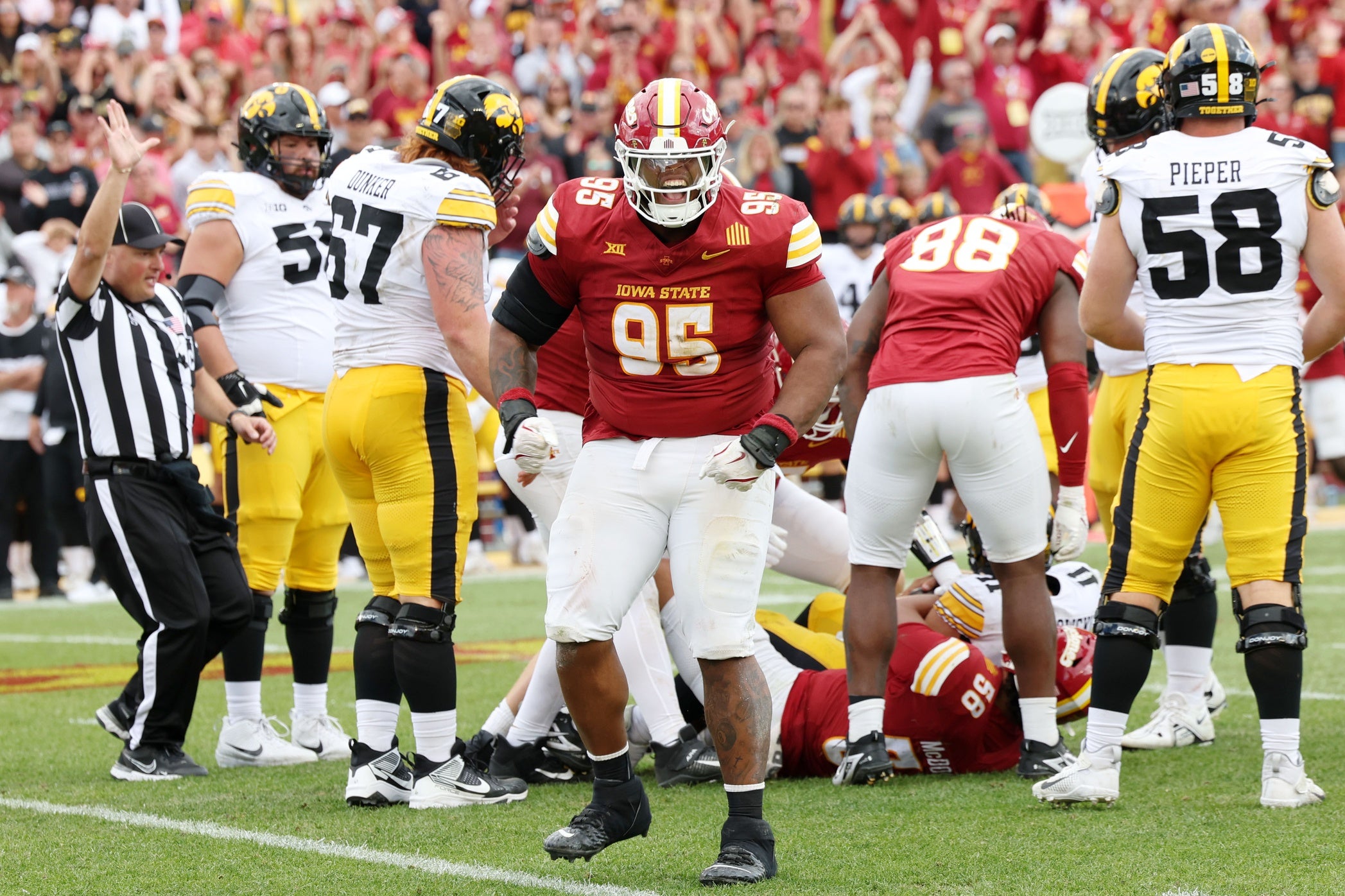 Sep 6, 2025; Ames, Iowa, USA; Iowa State Cyclones defensive lineman Domonique Orange (95) reacts after a play against the Iowa Hawkeyes during the second half at Jack Trice Stadium. Mandatory Credit: Reese Strickland-Imagn Images