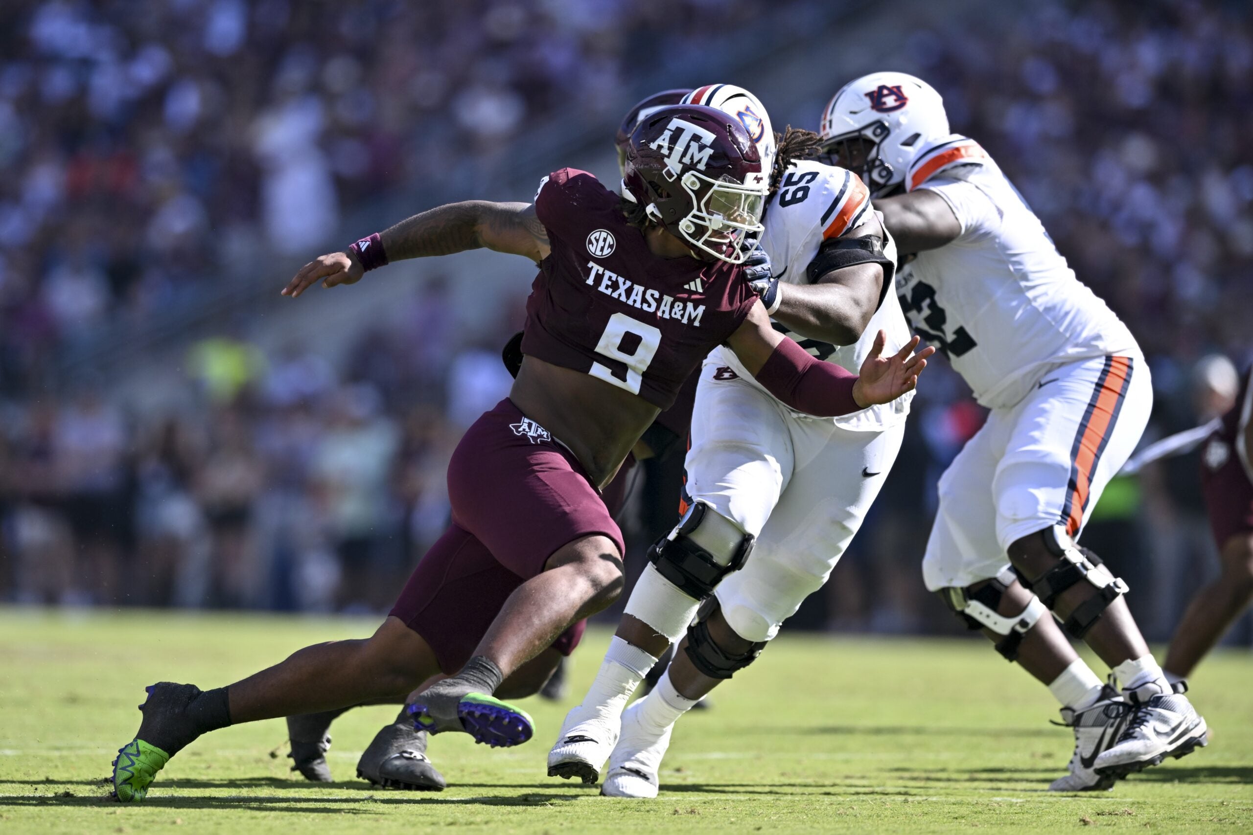 Sep 27, 2025; College Station, Texas, USA; Texas A&M Aggies defensive end Cashius Howell (9) defends in coverage against the Auburn Tigers during the second quarter at Kyle Field. Mandatory Credit: Maria Lysaker-Imagn Images
