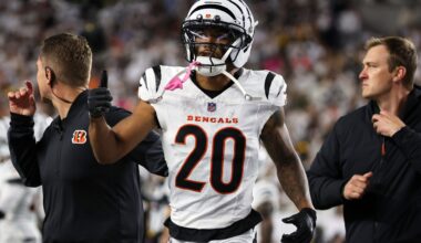 Oct 16, 2025; Cincinnati, Ohio, USA; Cincinnati Bengals cornerback DJ Turner II (20) gestures toward his bench as he walks off the field with an apparent injury against the Pittsburgh Steelers during the third quarter at Paycor Stadium.
