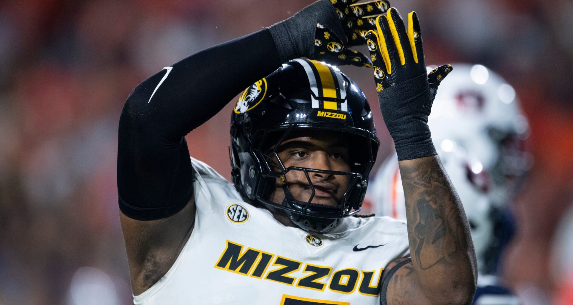 Missouri Tigers defensive tackle Chris McClellan (7) celebrates his sack as Auburn Tigers take on Missouri Tigers at Jordan-Hare Stadium in Auburn, Ala. on Saturday, Oct. 18, 2025. Missouri Tigers lead Auburn Tigers 10-7 at halftime.