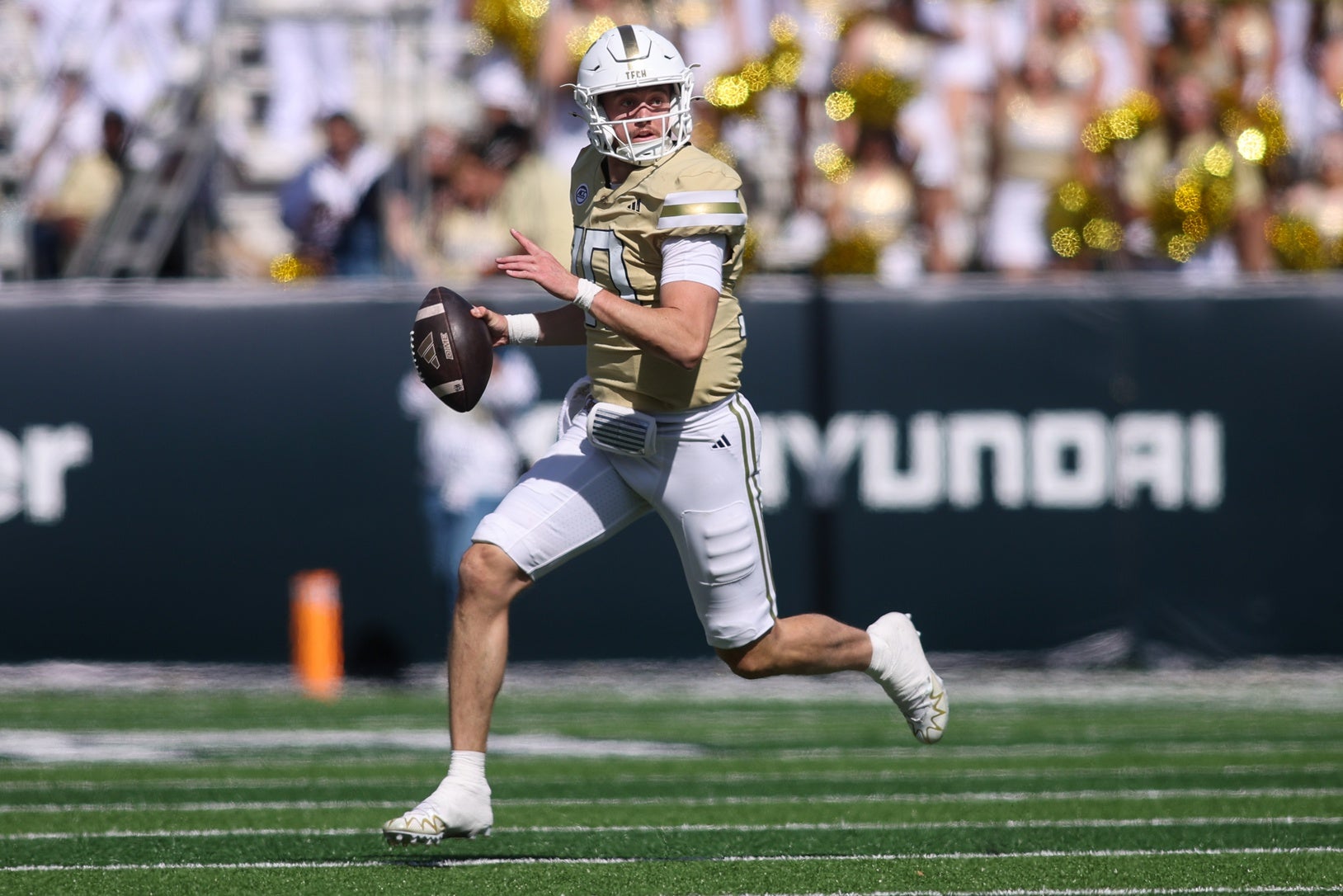 Oct 25, 2025; Atlanta, Georgia, USA; Georgia Tech Yellow Jackets quarterback Haynes King (10) scrambles against the Syracuse Orange in the second quarter at Bobby Dodd Stadium at Hyundai Field. Mandatory Credit: Brett Davis-Imagn Images