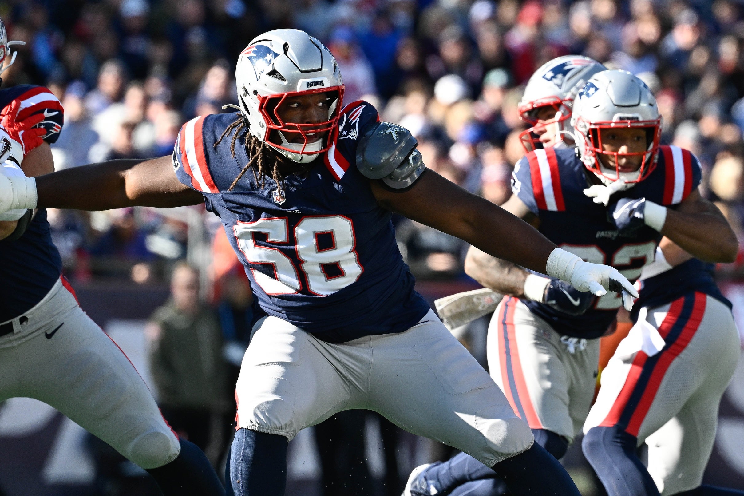 Nov 2, 2025; Foxborough, Massachusetts, USA; New England Patriots center Jared Wilson (58) in coverage during the first half against the Atlanta Falcons at Gillette Stadium.
