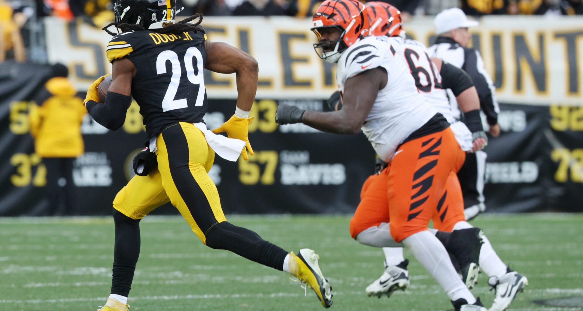 Nov 16, 2025; Pittsburgh, Pennsylvania, USA; Pittsburgh Steelers safety Kyle Dugger (29) intercepts the ball against the Cincinnati Bengals during the second half at Acrisure Stadium.