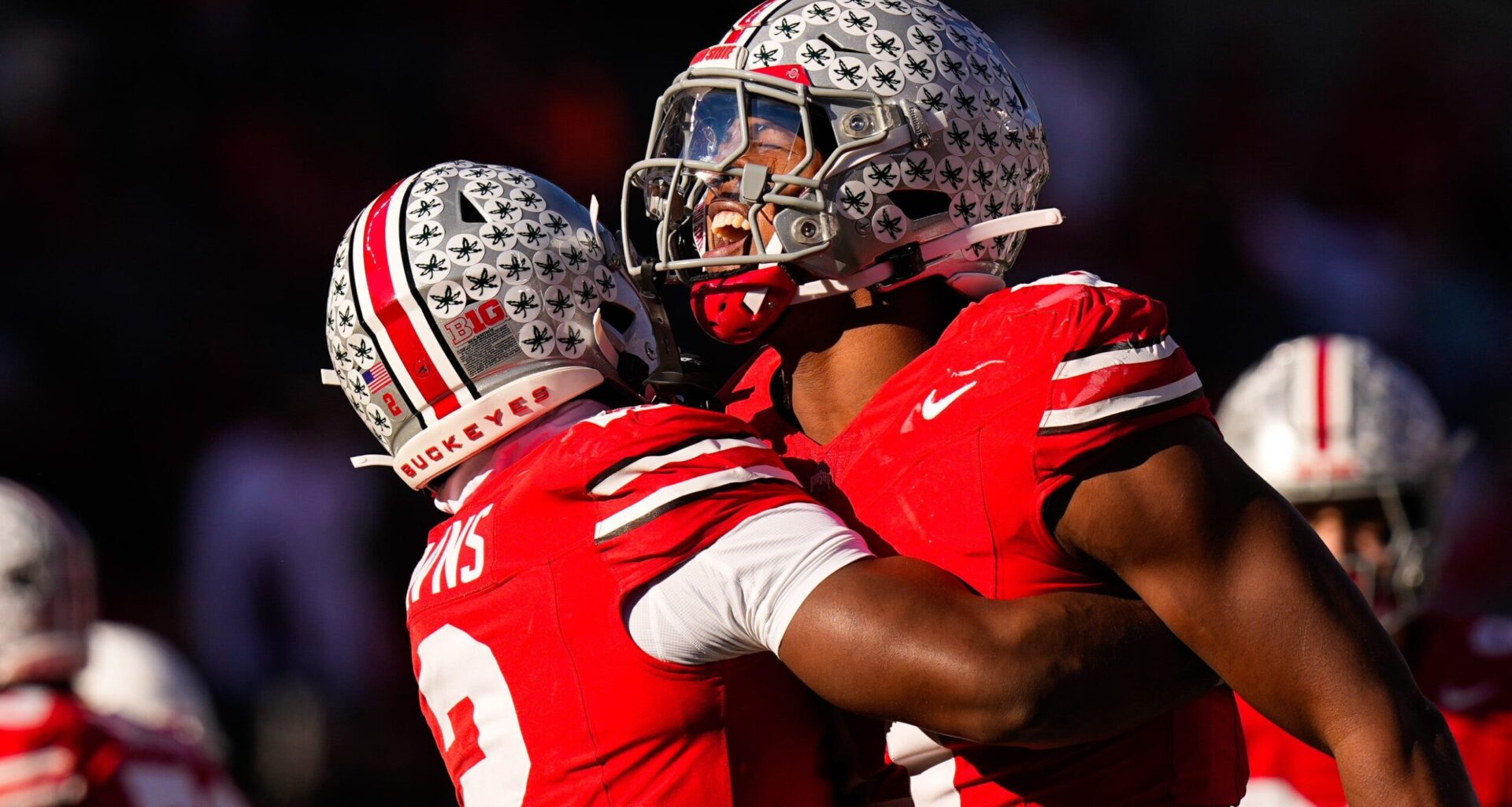Ohio State Buckeyes defensive back Caleb Downs (2) celebrates with linebacker Sonny Styles (0) after sacking Rutgers Scarlet Knights quarterback Athan Kaliakmanis (16) in the second half of the NCAA football game at Ohio Stadium on Saturday, Nov. 22, 2025 in Columbus, Ohio.