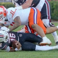 Clemson defensive lineman Peter Woods (11) sacks South Carolina quarterback LaNorris Sellers (16) after the Tigers’ 28-14 win at Williams-Brice Stadium in Columbia, S.C. Saturday, November 29, 2025.
