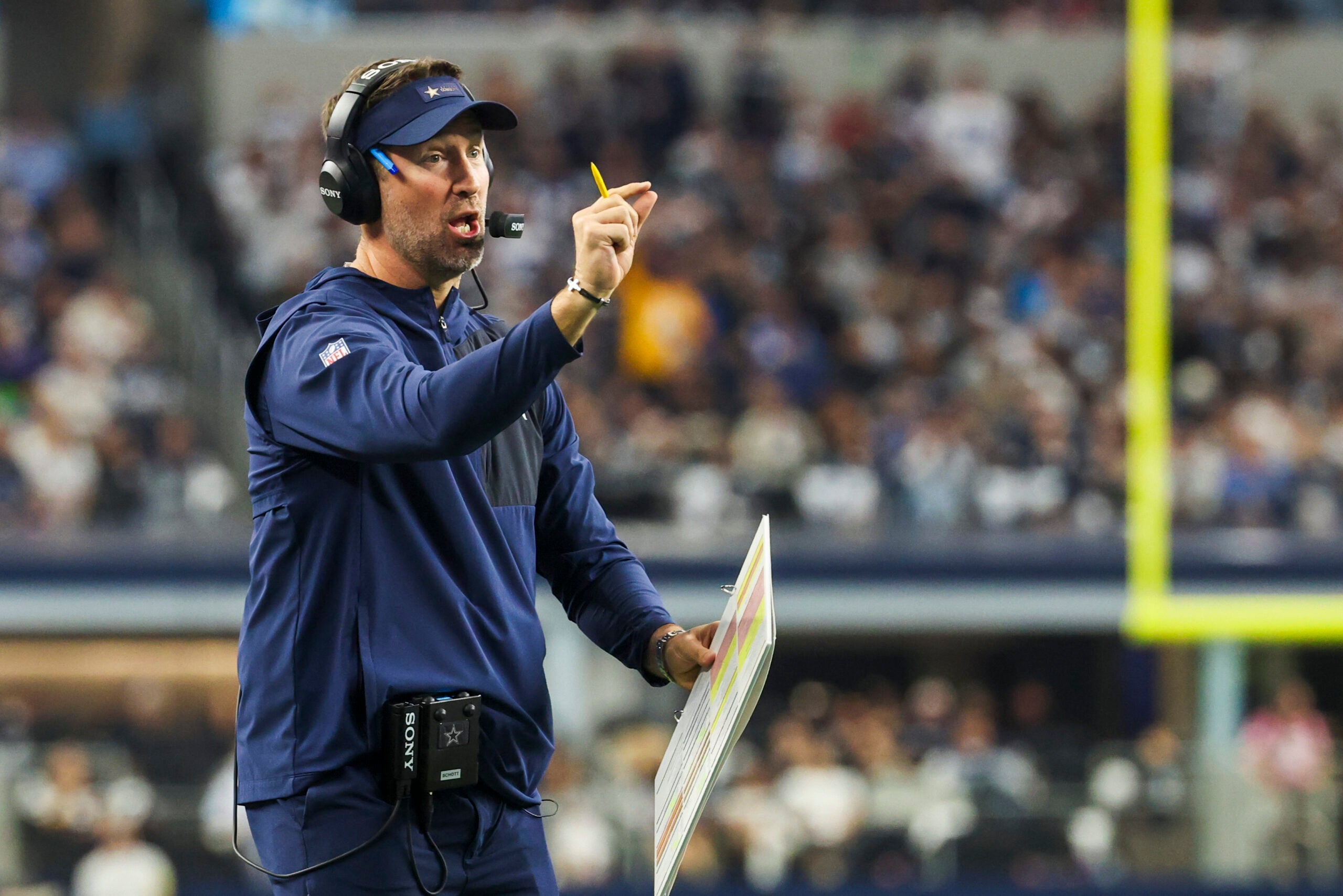 Dec 21, 2025; Arlington, Texas, USA; Dallas Cowboys head coach Brian Schottenheimer reacts to a play against the Los Angeles Chargers during the second quarter at AT&T Stadium.