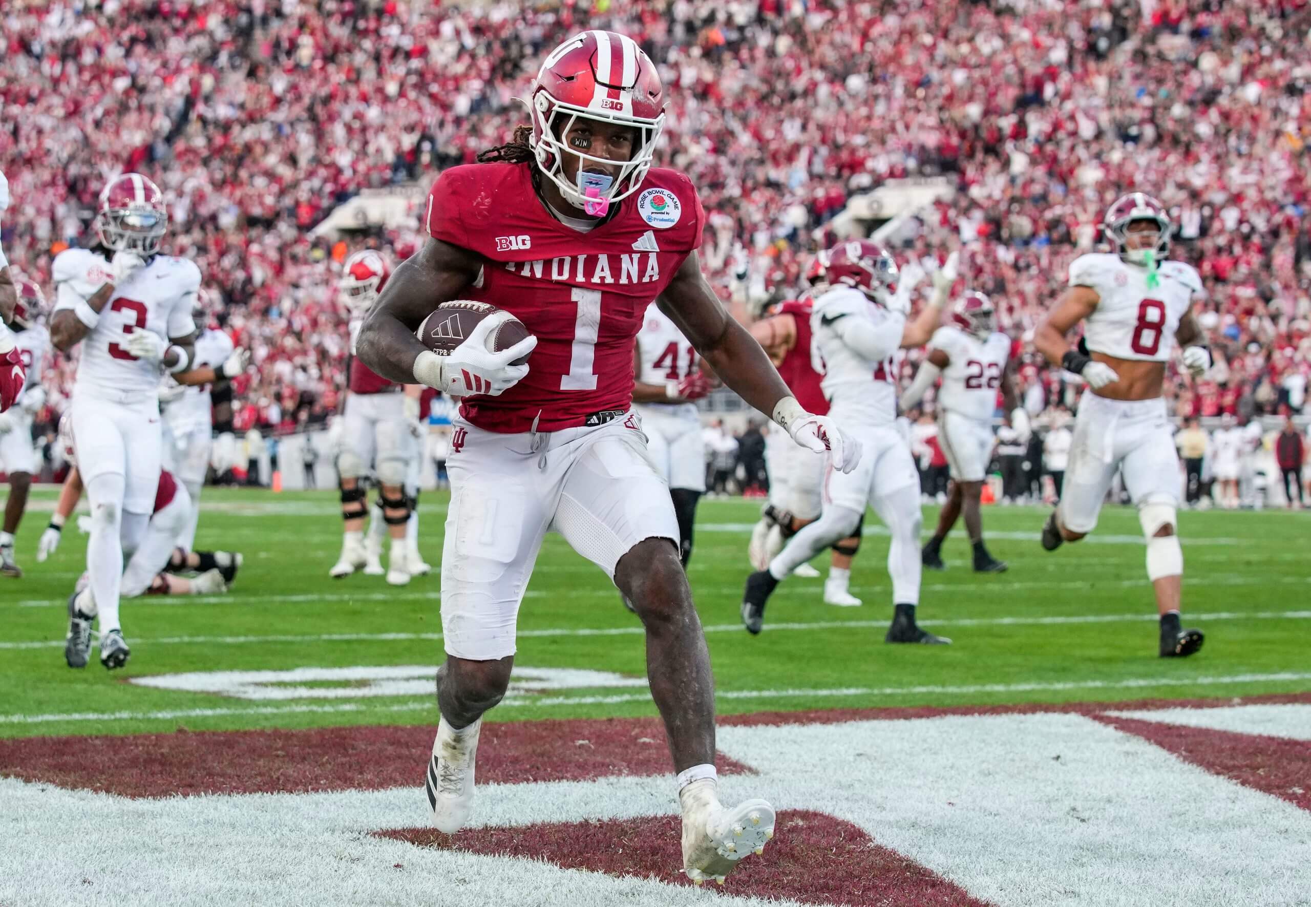 Indiana Hoosiers running back Roman Hemby (1) rushes into the end zone Thursday, Jan. 1, 2026, during the 112th annual Rose Bowl game in Pasadena. Indiana Hoosiers defeated Alabama Crimson Tide, 38-3.