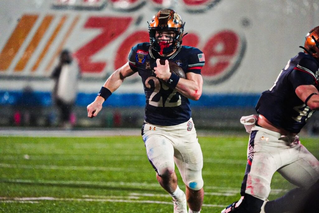 Navy’s Eli Heidenreich (22) rushes with the ball during the Liberty Bowl game against the Cincinnati Bearcats on Jan. 2, 2026 at Simmons Bank Liberty Stadium in Memphis, Tenn.