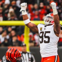 Jan 4, 2026; Cincinnati, Ohio, USA; Cleveland Browns defensive end Myles Garrett (95) celebrates following a sack against the Cincinnati Bengals during the fourth quarter at Paycor Stadium. The play set a new NFL single season sack record by Garrett. Mandatory Credit: Joseph Maiorana-Imagn Images