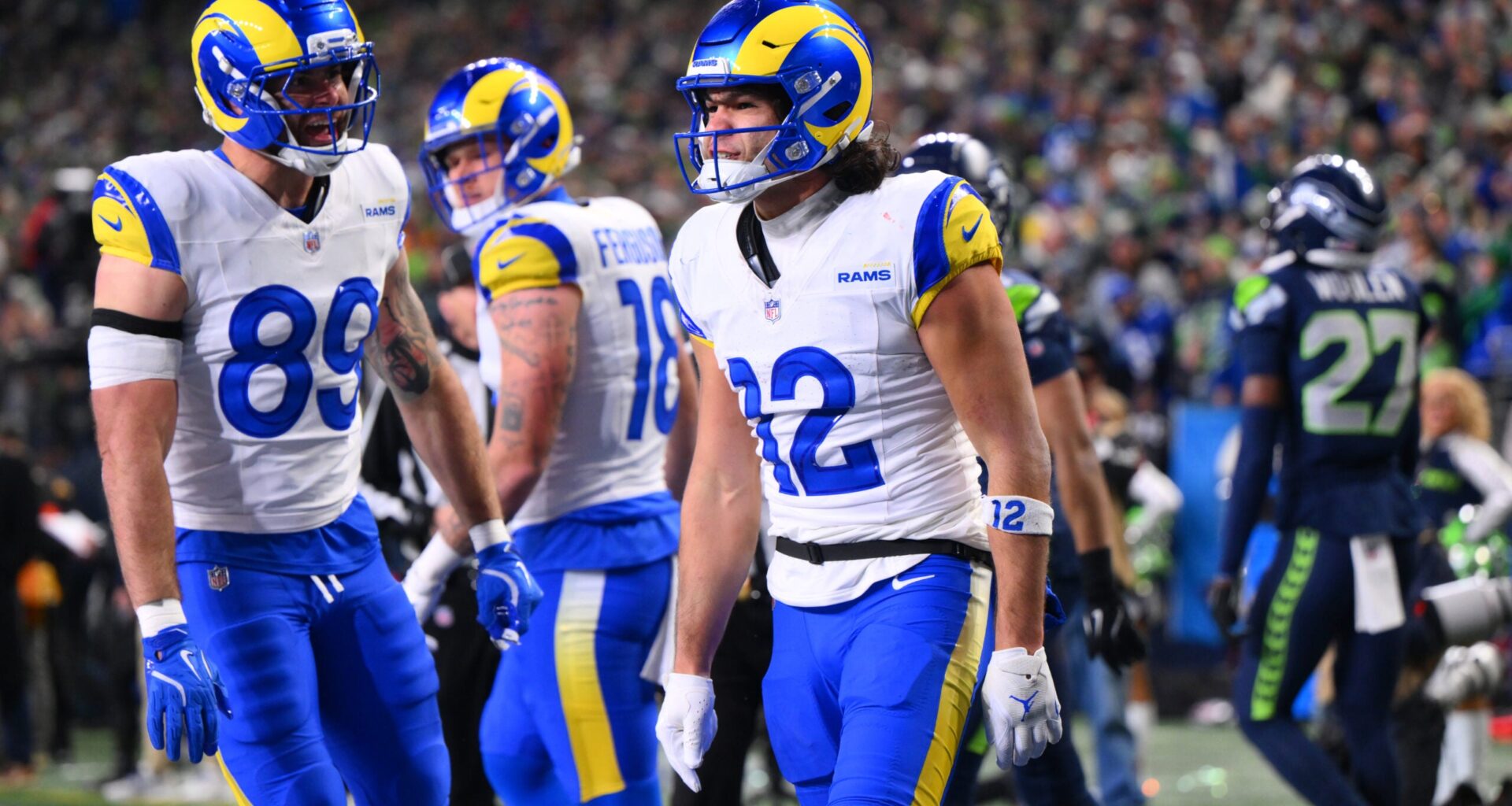 Jan 25, 2026; Seattle, WA, USA; Los Angeles Rams wide receiver Puka Nacua (12) celebrates after scoring a touchdown against the Seattle Seahawks during the second half in the 2026 NFC Championship Game at Lumen Field.