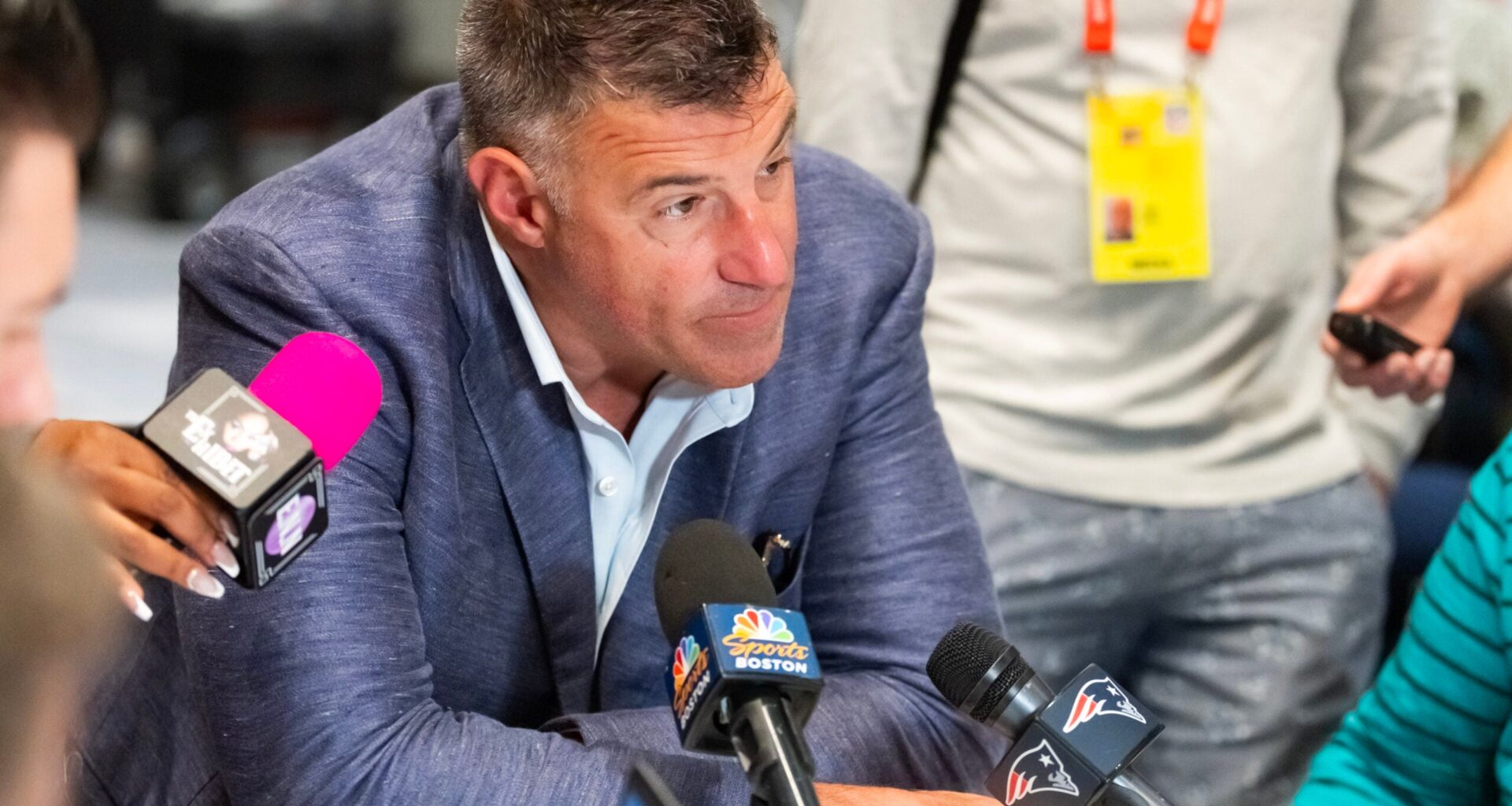 Mar 31, 2026; Phoenix, AZ, USA; New England Patriots head coach Mike Vrabel speaks to reporters in the media during the 2026 NFL Annual League Meeting at the Arizona Biltmore.