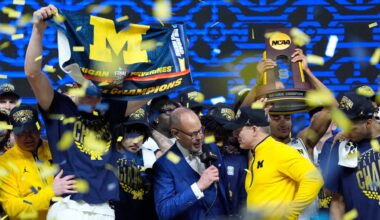 Michigan head coach Dusty May does an interview on stage as the team celebrates beating Connecticut to win the NCAA national championship at Lucas Oil Stadium in Indianapolis on Monday, April 6, 2026.