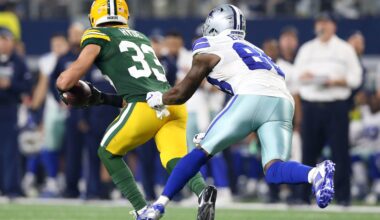 Jan 15, 2017; Arlington, TX, USA; Green Bay Packers strong safety Micah Hyde (33) runs the ball against Dallas Cowboys wide receiver Dez Bryant (88) after an interception during the third quarter in the NFC Divisional playoff game at AT&T Stadium.