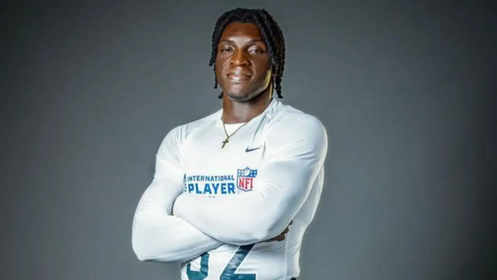 NFL International Player Pathway prospect poses in training gear during a studio portrait for the NFL’s global development program.
