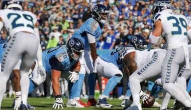 Tennessee Titans quarterback Cam Ward (1) at the line of scrimmage during the first half of an NFL football game against the Seattle Seahawks, Sunday, Nov. 23, 2025, in Nashville, Tenn. (AP Photo/Stew Milne)
