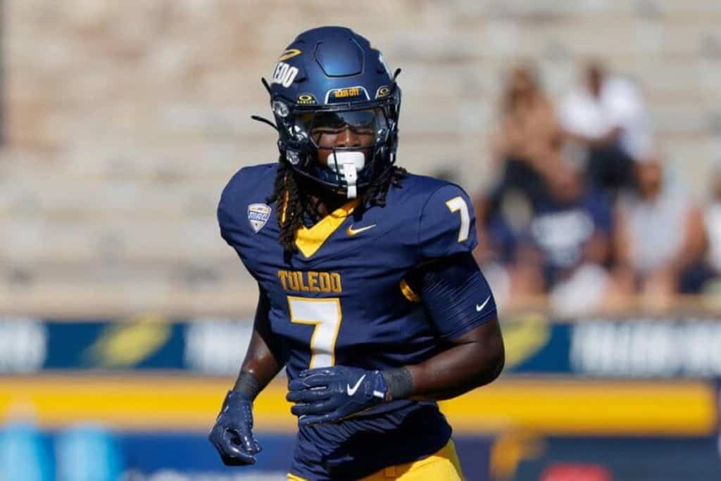 Dallas Cowboys Mock Draft prospect Toledo safety runs across the field during game action
