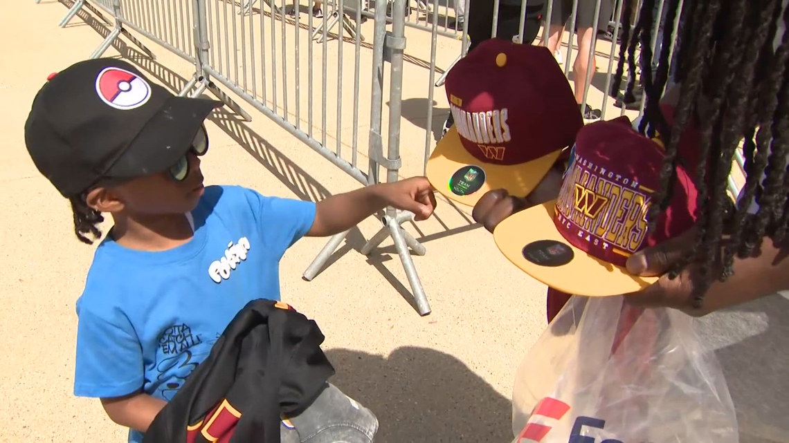 'Back to the roots' | Commanders fans line up for hours for new uniform reveal