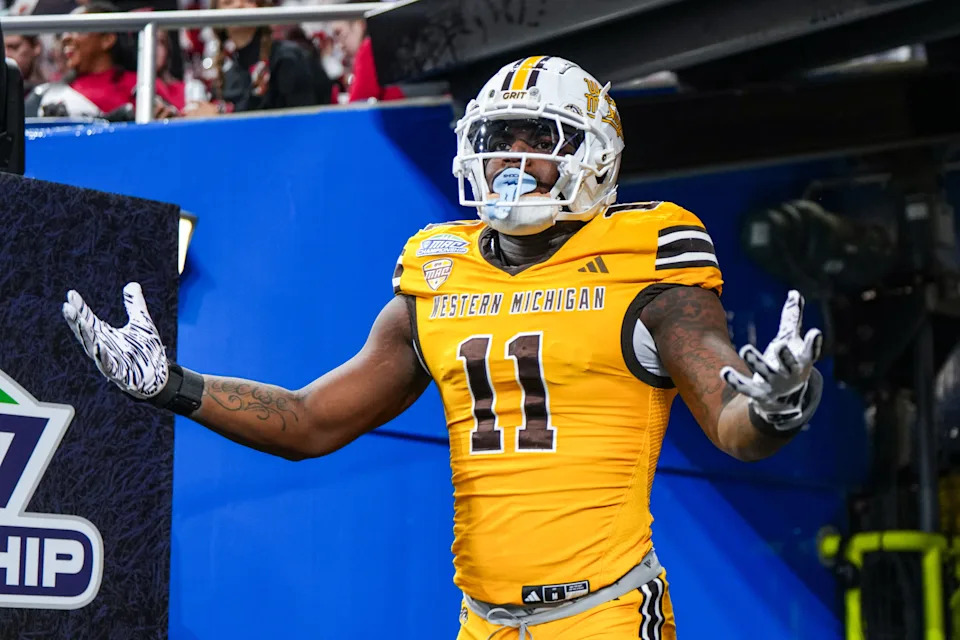Western Michigan defensive lineman Nadame Tucker (11) enters the field before the MAC Championship in Detroit on Saturday, Dec. 6, 2025.