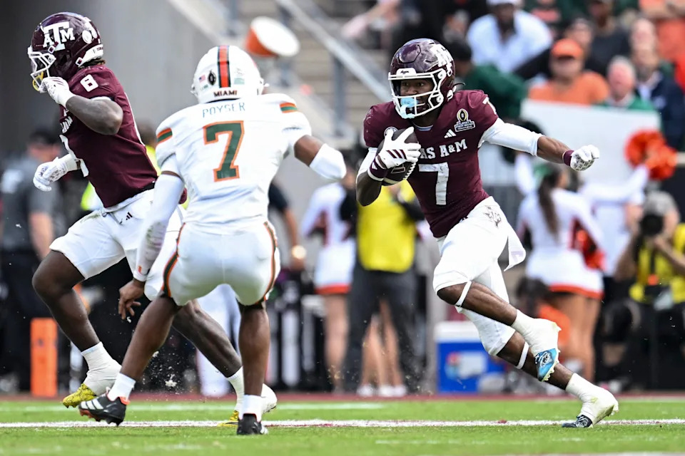 Dec 20, 2025; College Station, TX, USA; Texas A&M Aggies wide receiver KC Concepcion (7) runs the ball against the Miami Hurricanes during the second half at Kyle Field.