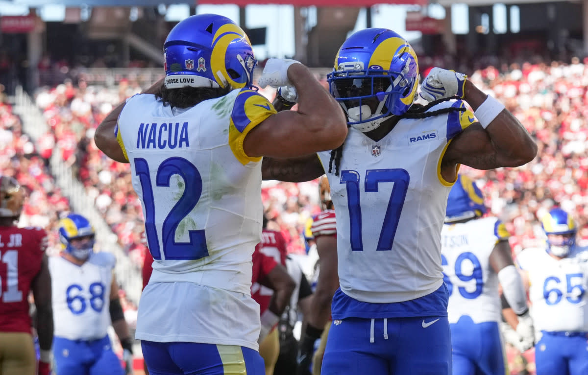 Puka Nacua and Davante Adams celebrate after a touchdown during the first quarter against the San Francisco 49ers at Levi's Stadium.Cary Edmondson-Imagn Images