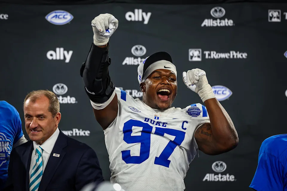 CHARLOTTE, NORTH CAROLINA - DECEMBER 06: Wesley Williams #97 of the Duke Blue Devils celebrates after the 2025 ACC Football Championship against the Virginia Cavaliers at Bank of America Stadium on December 06, 2025 in Charlotte, North Carolina. (Photo by David Jensen/Getty Images)