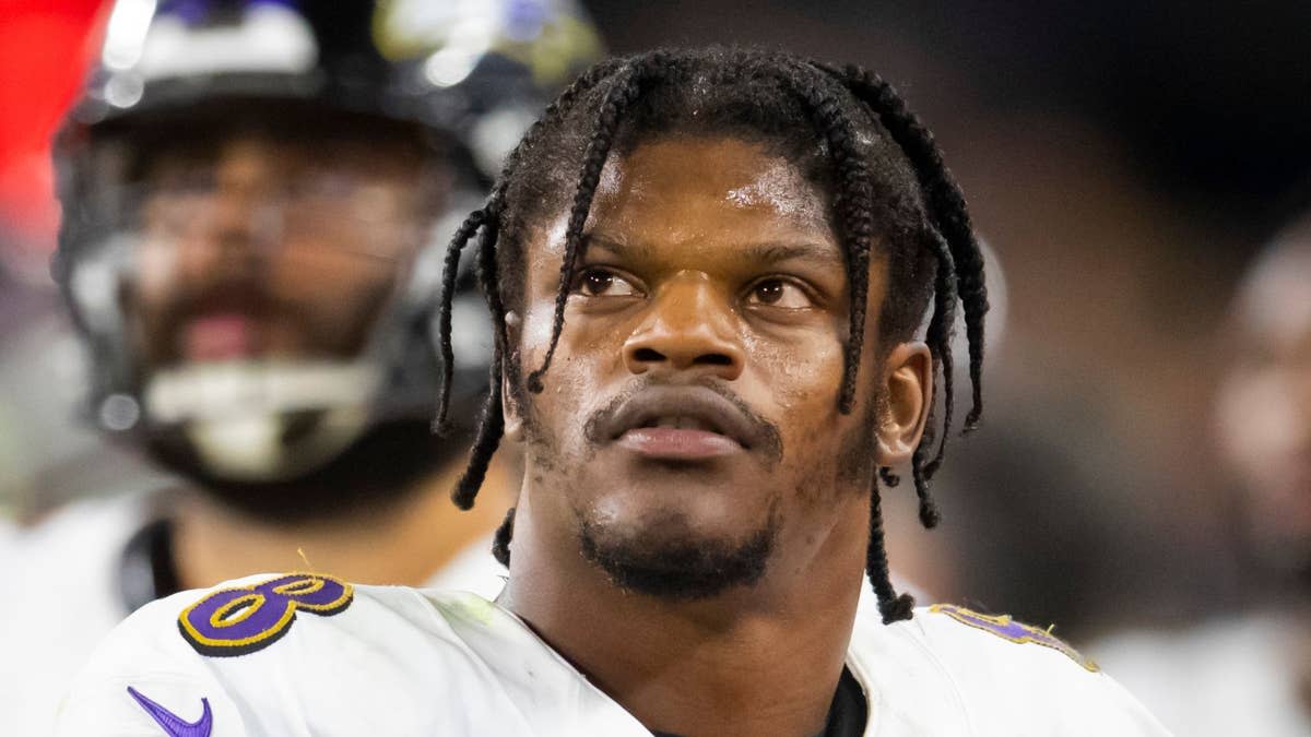 Baltimore Ravens quarterback Lamar Jackson (8) looks on.Mark J&period; Rebilas-Imagn Images