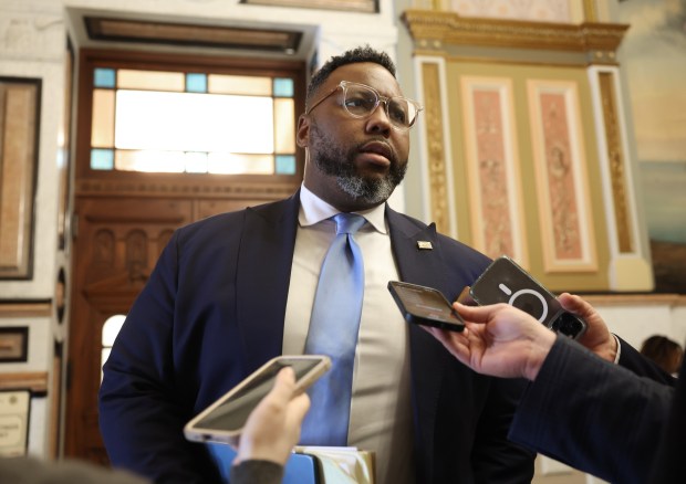 State Rep. Kam Buckner answers reporters' questions at the Illinois State Capitol on May 29, 2025, in Springfield. Buckner is leading the Bears stadium negotiations in the House, saying that lawmakers are "extremely close to the finish line" on an amended PILOT bill. (John J. Kim/Chicago Tribune)