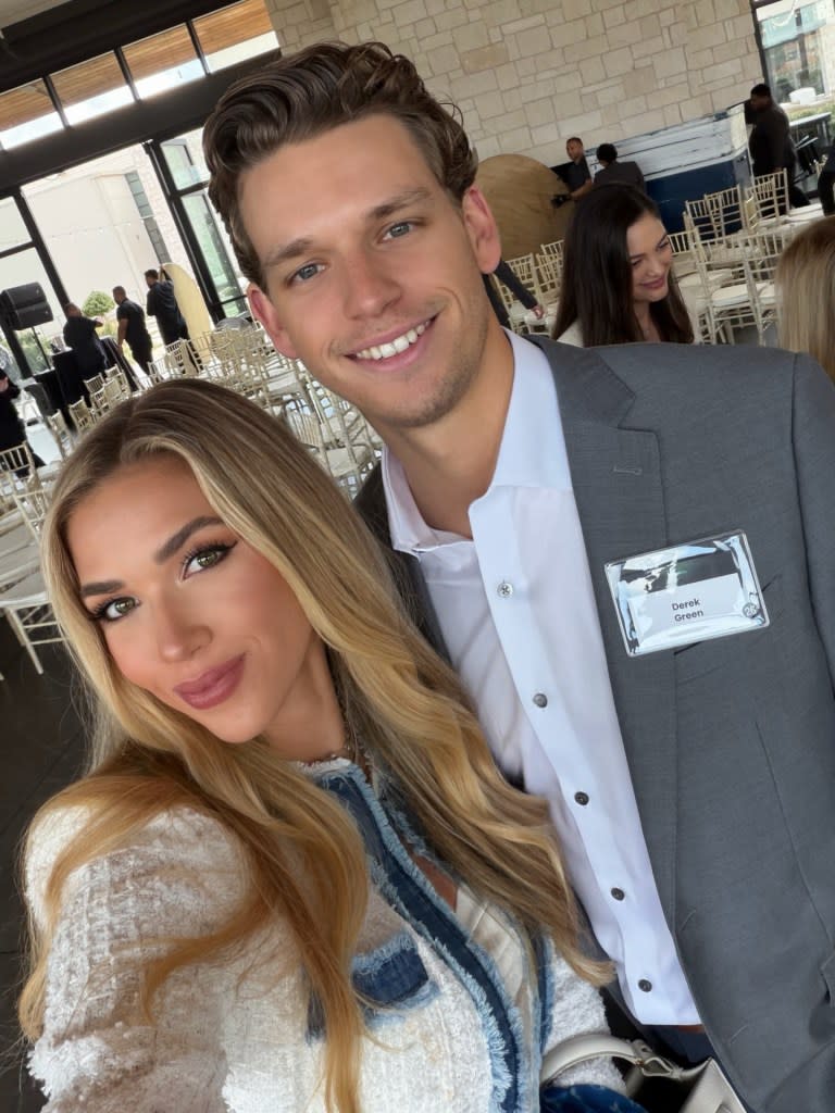 The photos showed Derek (pictured here with Gracie last month) down on one knee as he popped the question beneath an outdoor altar. graciehunt/instagram