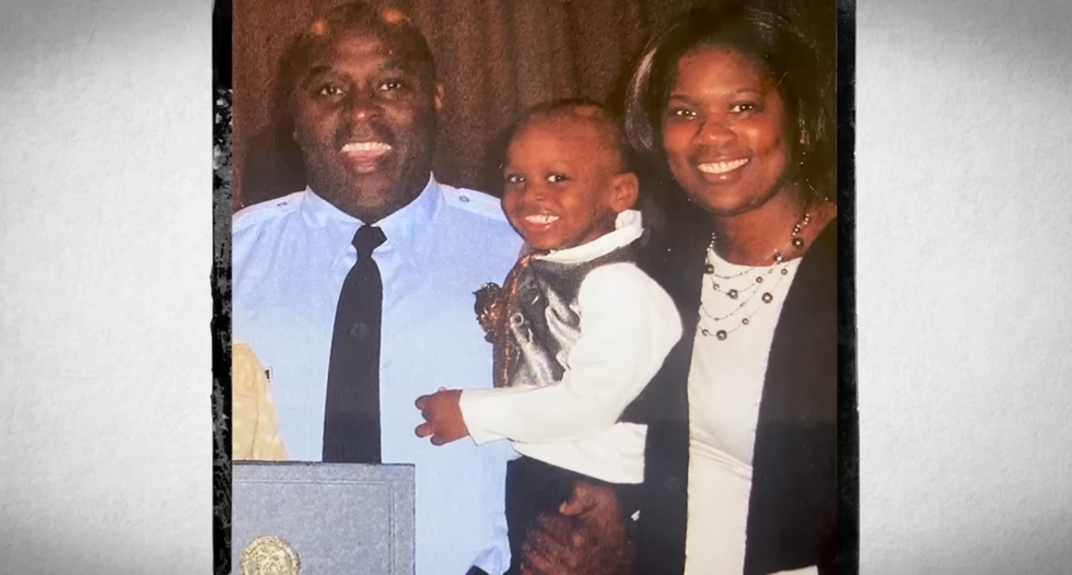 Family portrait featuring a couple and a child, with facial details obscured.